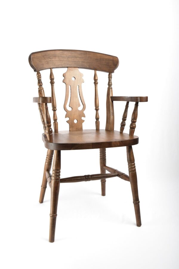 A wooden chair with arms and back rests.